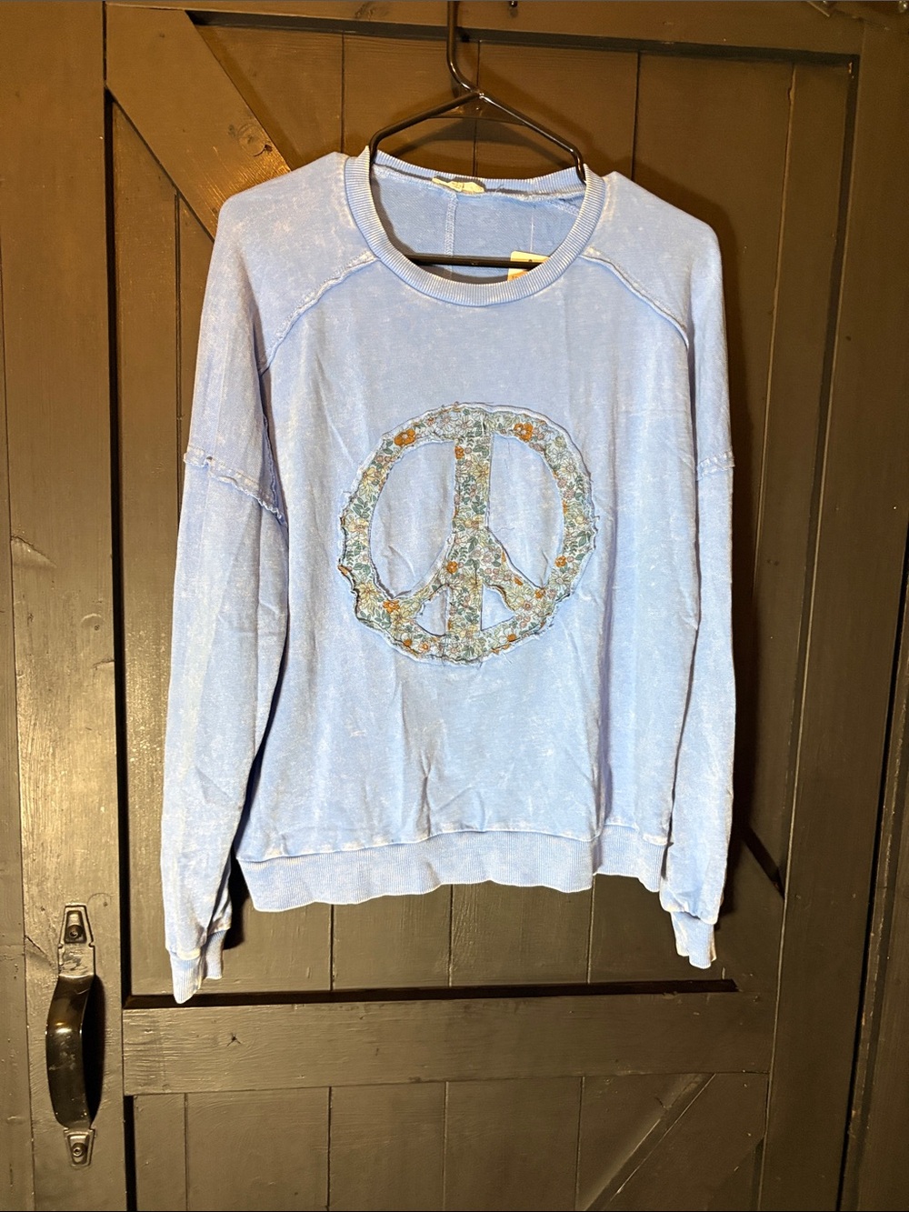 easel Light Blue Crewneck Sweatshirt with Floral Peace Applique